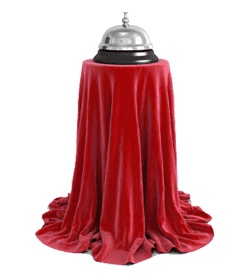 Service Bell on the table with a red table cloth